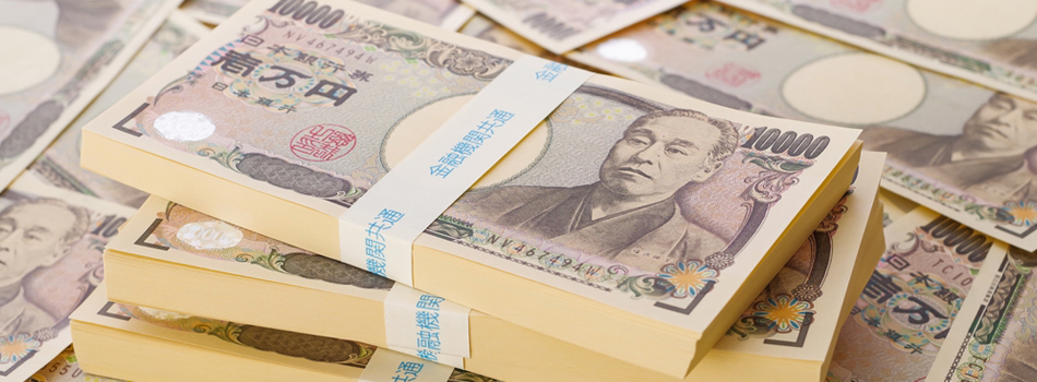 積まれた1万円札の札束