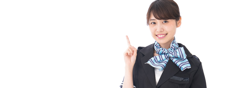 人差し指を立てた女性